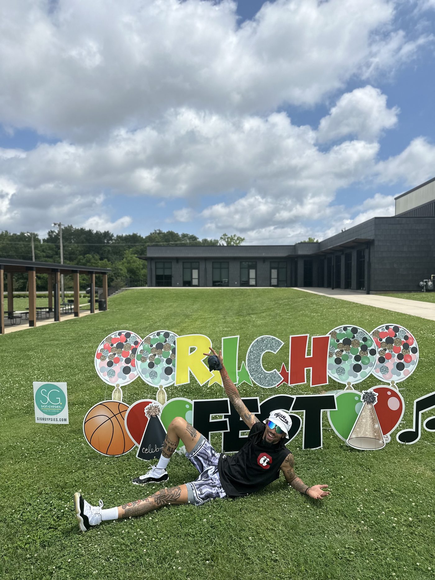 CT with R.I.C.H. Fest sign